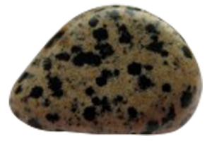 Красив седиментен камък с кафяв фон и черни точки